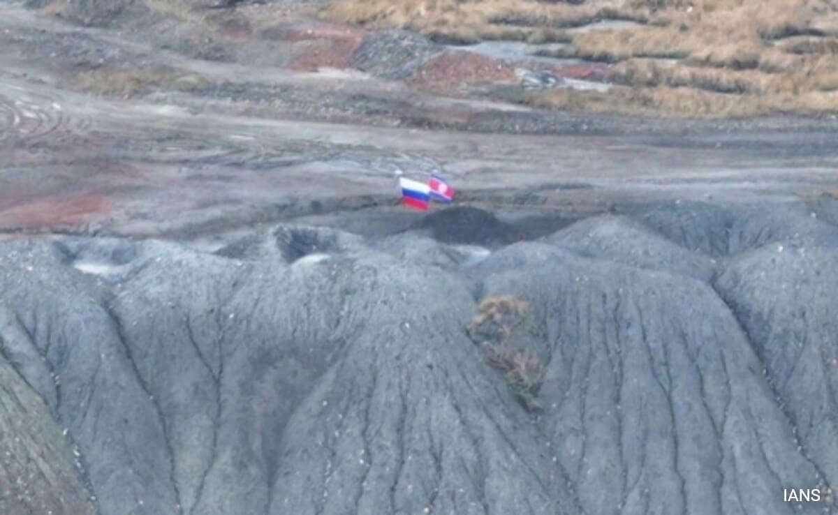 Russian, North Korean Flags Seen On Ukraine Battlefield: Report