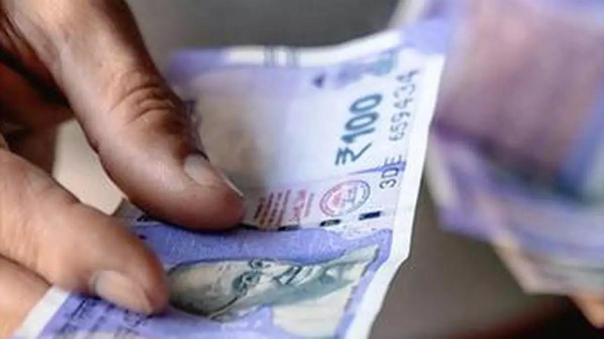 Rupee slips 4 paise to settle at 84.09 against US dollar