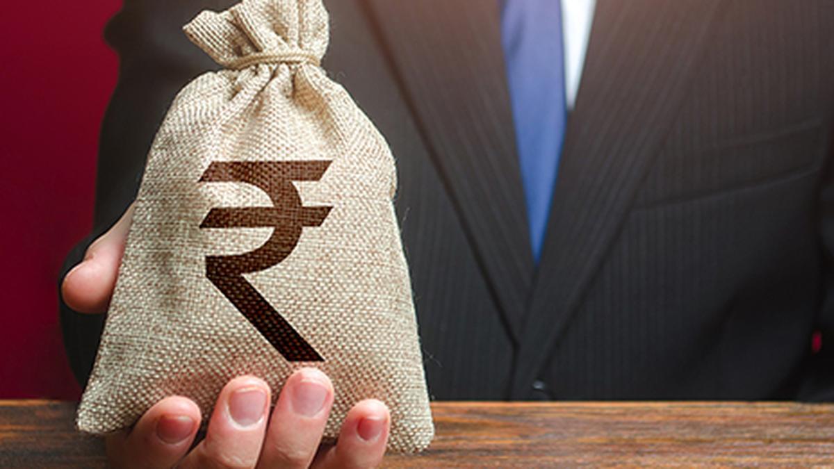 Rupee moves in narrow range, rises 1 paise against US dollar in early trade